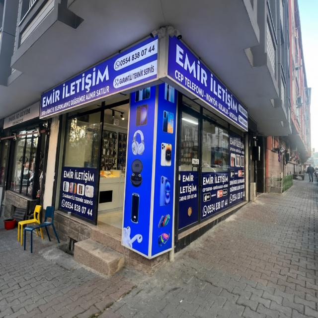 Emir İletişim mağazasının dış cephesi, mavi tabela, Megapol Tower altı, Adalet Mahallesi, Bayraklı